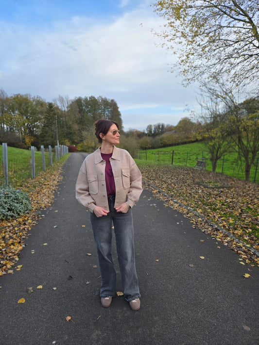 Veste en maille avec col et poches. Beige/doré