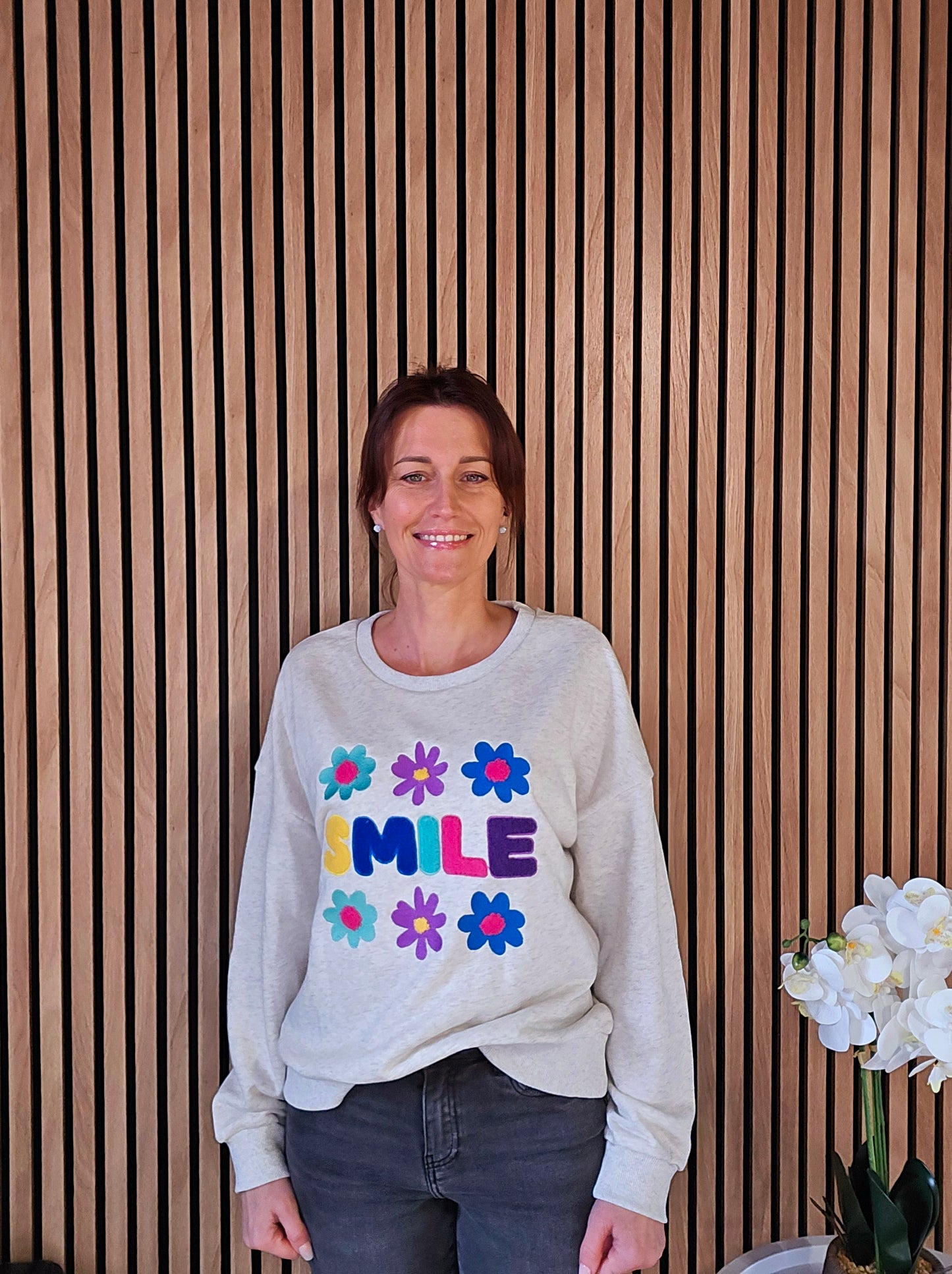 Sweat "Smile" fleurs. Beige chiné