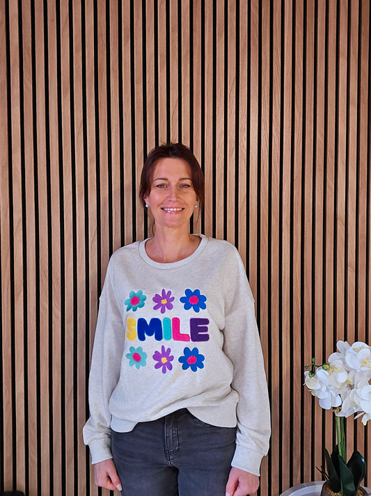 Sweat "Smile" fleurs. Beige chiné